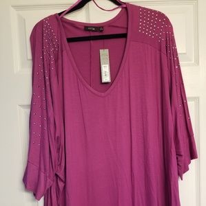 Shirt with studded sleeves